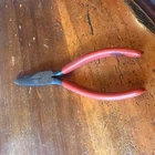Snap-on Red Handled Needle Nose Pliers Model Number 597CP Used. Price: $22.00.