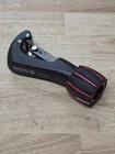 Matco Tools TTC18 Constant Tension Swing Tubing Cutter, Through 1-1/8" Used. Price: $49.99.